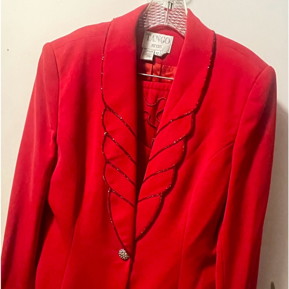 Two piece suit, red.